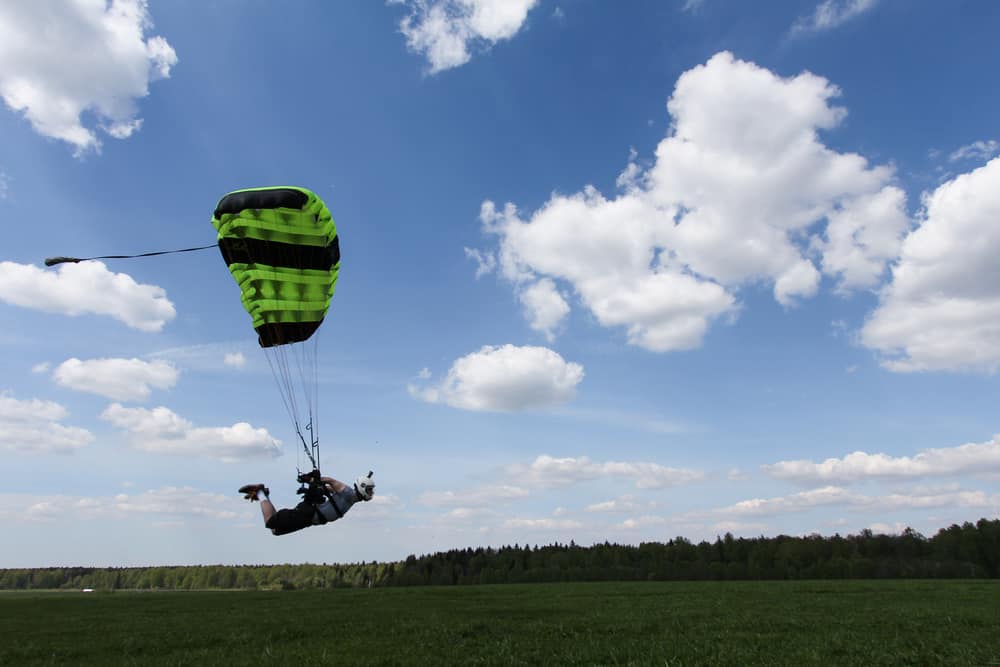 Swooper with a canopy just over ground in a high speed landing.