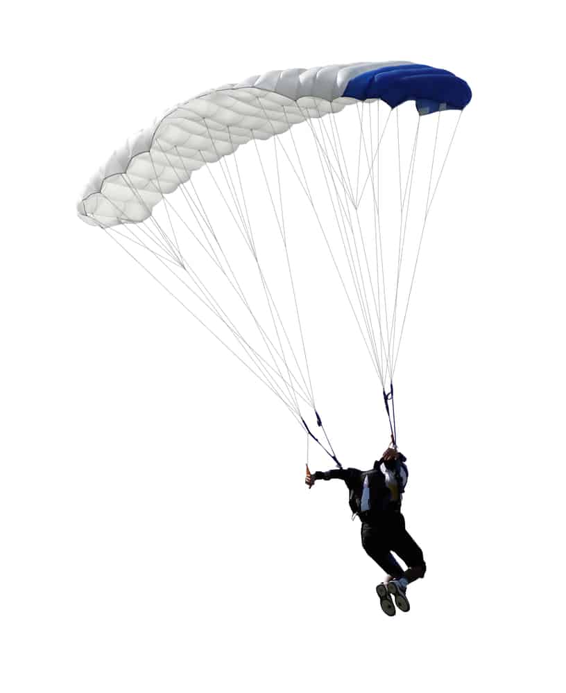 Skydiver with white and blue parachute - white background.