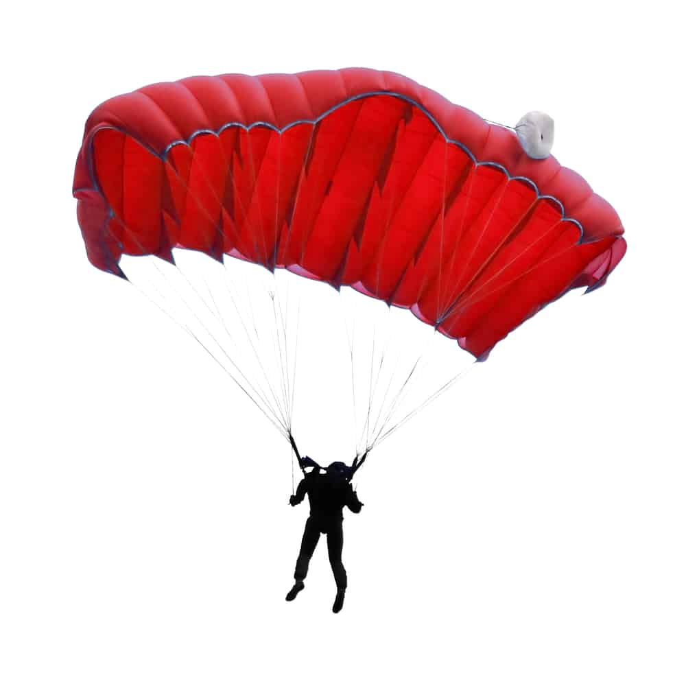 Skydiver in the air - red parachute.